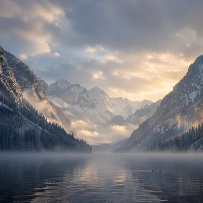 Misty Alpine Lake Valley at Dawn