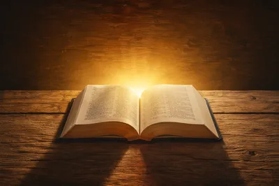 Open Scripture Book with Golden Glow