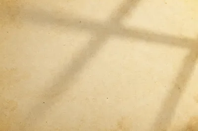 Aged Parchment Background with Soft Cross Shadow