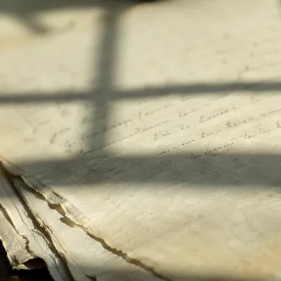 Aged Parchment with Gentle Cross Shadow