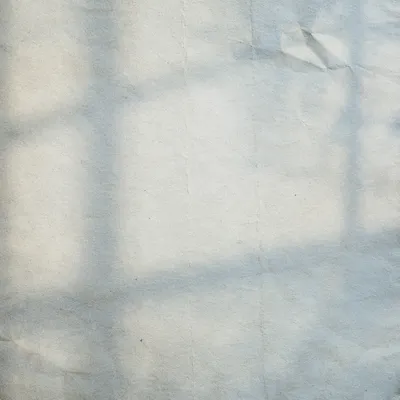 Aged Parchment With Soft Cross Shadow