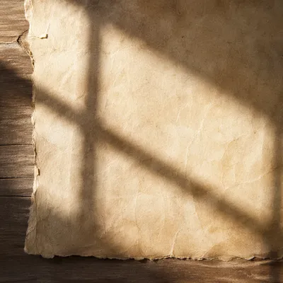 Warm Parchment Background with Cross Shadow