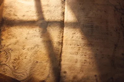 Aged Parchment Cross Shadow Background