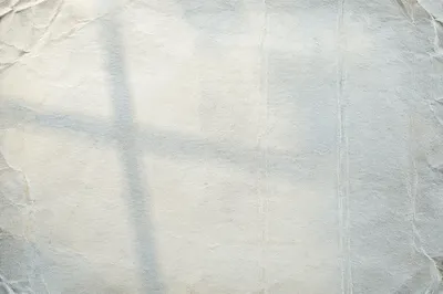 Aged Parchment with Soft Cross Shadow