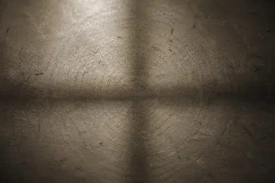 Aged Parchment With Gentle Cross Shadow