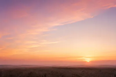 Peaceful Pastel Dawn Sky Background