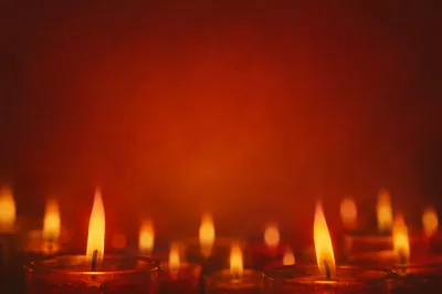 Red and Orange Candle Flames Close-Up