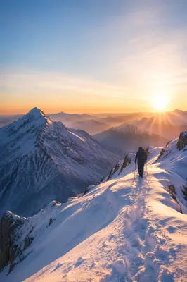 Lone Climber at Sunrise Mountain Ridge