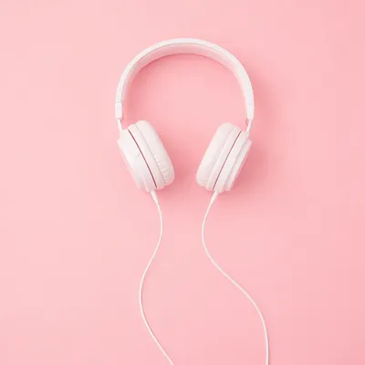 Soft Pink Headphones Flat Lay Background