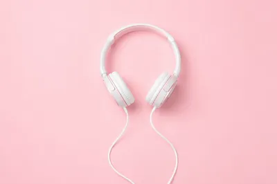 Soft Pink Headphones Flat Lay Background