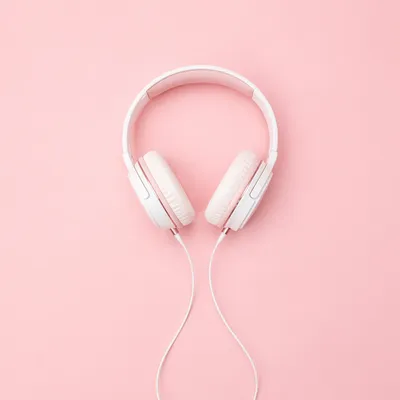 Soft Pink Headphones Flat Lay Background