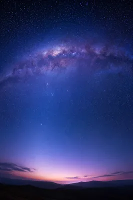 Purple Blue Galaxy Over Distant Hills
