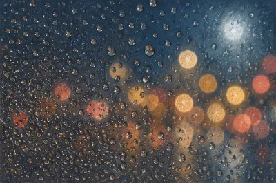 Rain Drops on Window With City Bokeh