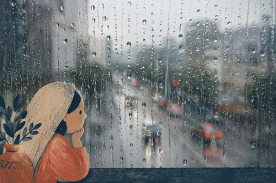 Rain Droplets on Window with Blurred City