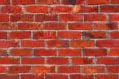 Bold Vibrant Red Brick Wall Background