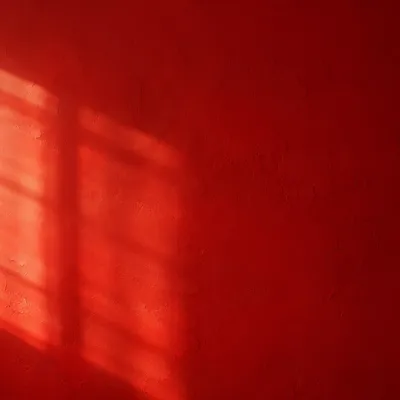 Bold Red Textured Plaster Wall Background
