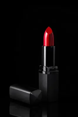 Vivid Red Lipstick on Black Luxury Background