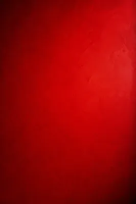 Vibrant Solid Red Plaster Wall