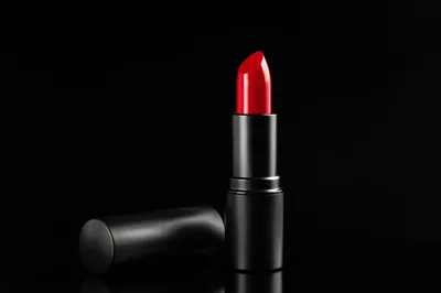 Vivid Red Lipstick on Black Luxury Background