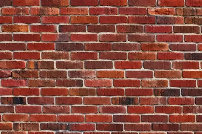 Bold Vibrant Red Brick Wall Background