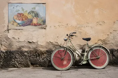 Retro Bicycle Against Faded Stucco Wall