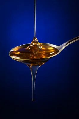 Royal Blue Honey Syrup Macro Background