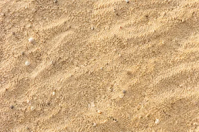 Sunrise Beach Sand Texture Background