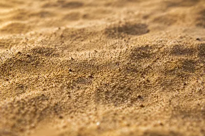Golden Beach Sand Macro Texture Background