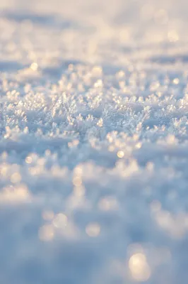 Sparkling White Snow Crystal Macro Background