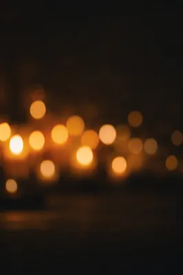 Warm Amber Bokeh Lights on Dark