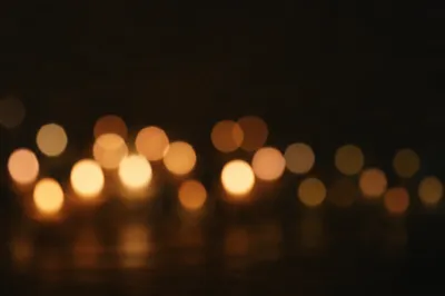 Warm Amber Bokeh Lights on Dark