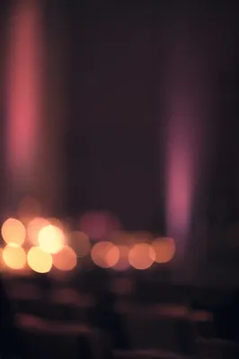 Soft Amber Bokeh on Dark Mauve