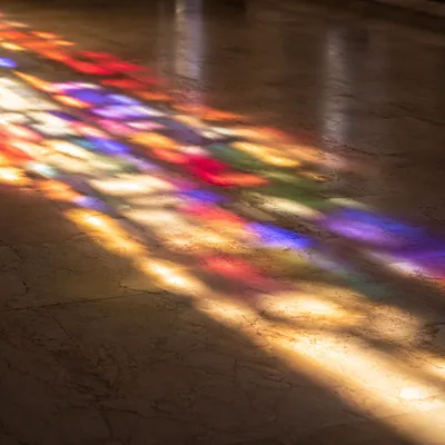Colorful Stained Glass Light on Sanctuary Floor
