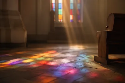 Colorful Stained Glass Light on Stone Floor