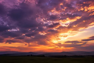 Dramatic Sunrise Clouds Over Quiet Horizon