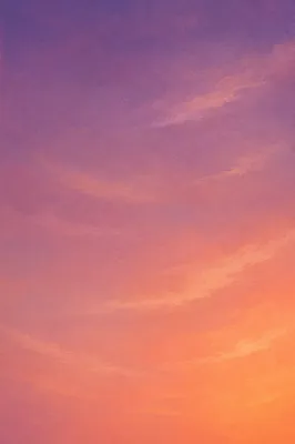 Pastel Sunset Sky Gradient with Soft Clouds
