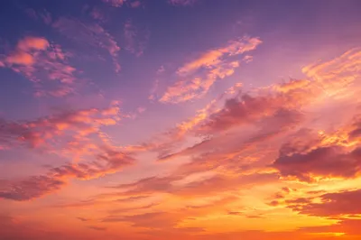Dreamy Sunset Sky Gradient with Clouds