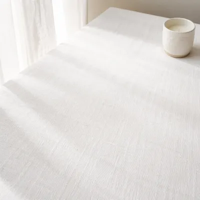 Minimal White Linen Tabletop with Candle
