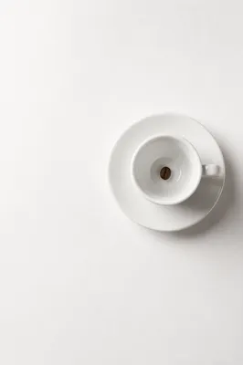 Minimal White Espresso Cup With Coffee Bean