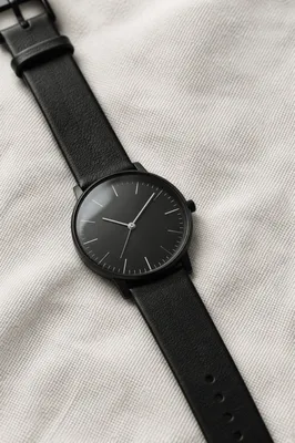 Minimal Black Wristwatch on White Background