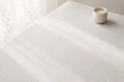 Minimal White Linen Tabletop with Candle