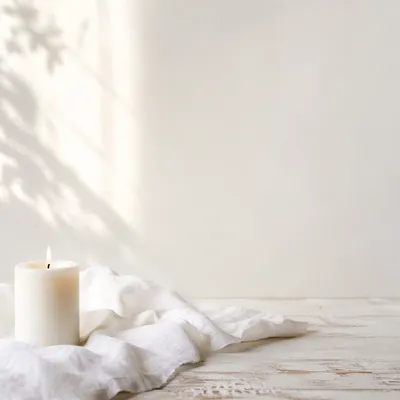 Minimal White Tabletop with Ivory Candle
