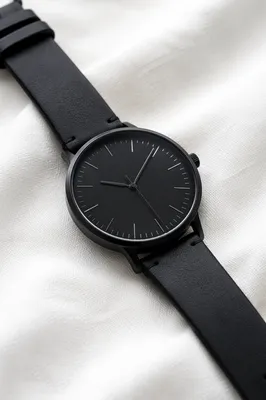 Minimal Black Wristwatch on White Background