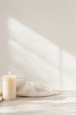 Minimal White Tabletop with Ivory Candle