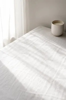 Minimal White Linen Tabletop with Candle