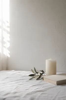 Minimal White Tabletop with Candle and Book