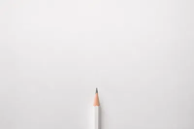 Minimal White Pencil Background with Copy Space