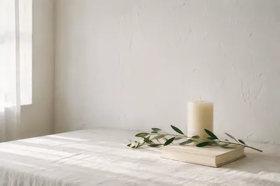 Minimal White Tabletop with Candle and Book