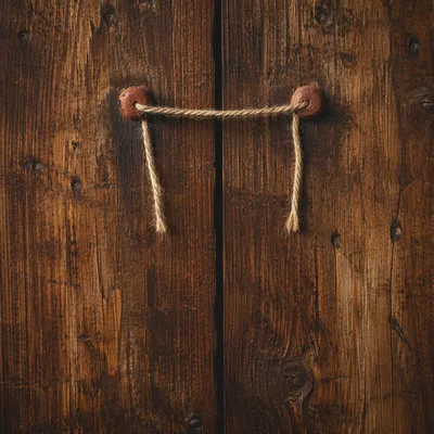 Rustic Brown Wooden Planks With Twine