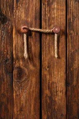 Rustic Wooden Planks with Hanging Twine
